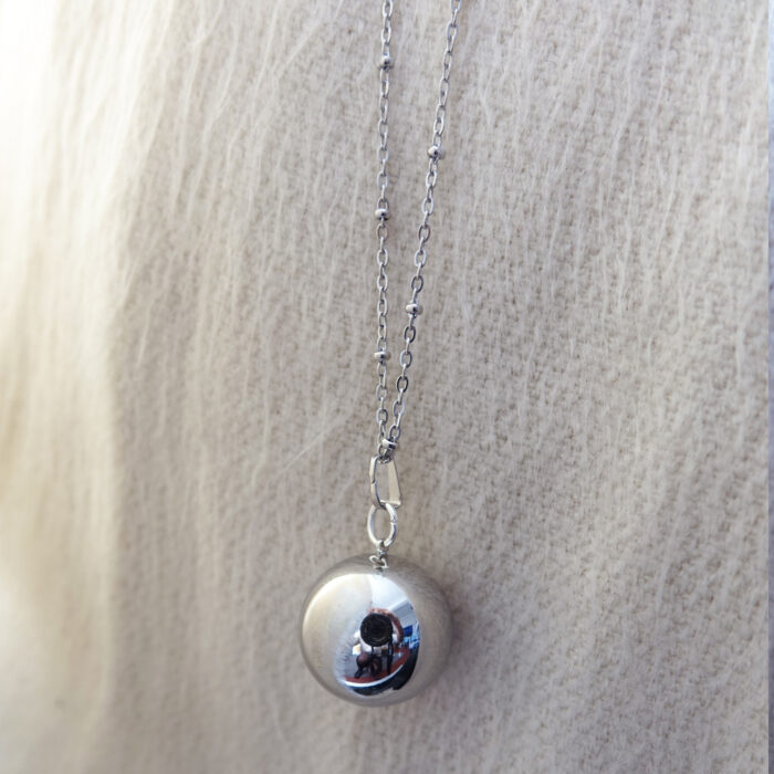 Silver bola on chain